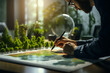 © ZMPixels - Businessman planning on environmental protection initiative for clean and sustainable future ecology, ESG environmental social governance display on paper chart on eco-friendly company