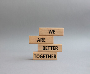 Wall Mural - We are better together symbol. Wooden blocks with words We are better together. Beautiful grey background. We are better together concept. Copy space.