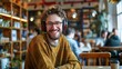 © Bijac - happy hipster guy enjoying music with headphones in cafeteria lifestyle portrait