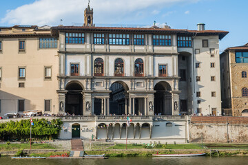 Wall Mural - Facade of the Uffizi gallery in front of the Arno river, Florence ITALY