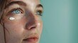 © SHOTPRIME STUDIO - Close up portrait of a woman with freckles and cream on her eye, beauty and skincare concept