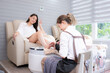 © Wosunan - A nail technician is using tools to cut and polish foot of a customer.