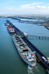 coal ship at the coal terminal wharf in gladstone, queensland