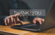 © Nirusmee - businessman using a laptop and touching the message thank you on a display screen. concept of thank you business, congratulations, and appreciation gratitude. presentation from technology digital