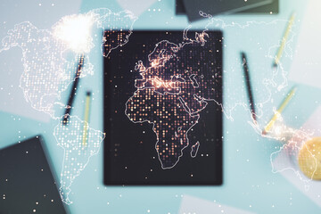 Wall Mural - multi exposure of abstract graphic world map and modern digital tablet on background, connection and