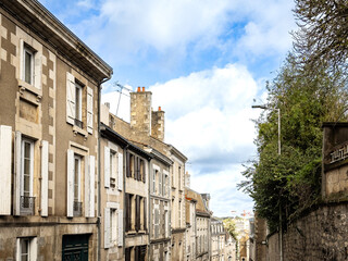Wall Mural - Street view of old village Poitiers in France