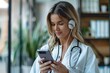 © Sandu - Woman in white lab coat using cell phone