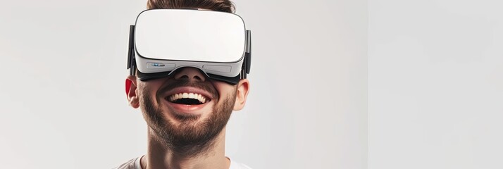 Wall Mural - A man with a beard joyfully explores virtual reality through white VR glasses on a flat white backdrop. Generative AI