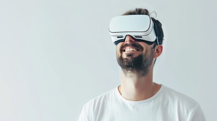 Wall Mural - A bearded man joyfully wearing virtual reality glasses on a white background. Generative AI