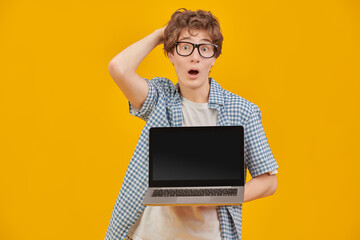 Wall Mural - shocked student with laptop