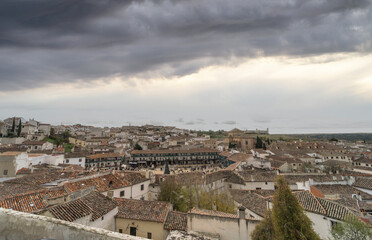 Wall Mural - Panoramic views of the medieval village of Chinchon on a cloudy day.