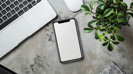 A Mock up of an blank smartphone with laptop on table, Top view of modern office space