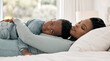 © peopleimages.com - Portrait, boy and mother in bed with hug, support and childhood development for love and affection. Black woman, son and bonding in home, together for care as family on weekend for memory or emotion