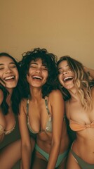 Wall Mural - Three women are smiling and laughing together