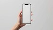 © Leopard - Mockup iphone hand - clipping path , Studio shot of Smartphone iPhone 15 Pro Max with blank phone screen