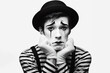 © Ольга Лукьяненко - Sad mime black and white Isolated on white background