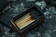 © Jorge Ferreiro - Matches box with its burnt stick