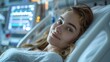 © Александр Лобач - A girl in the intensive care unit at the hospital . A critically ill woman lying in the intensive care unit