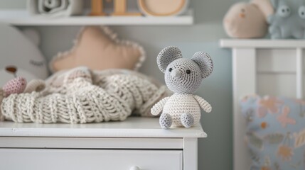 Sticker - Handmade crochet mouse doll, on a white dresser in the baby's room generative ai