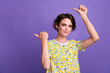 © deagreez - Photo of lovely cute girl wear trendy clothes two arms above head presents billboard empty space isolated on purple color background
