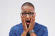 © peopleimages.com - Announcement, surprise and portrait of black man with news and info on white background in studio. Shocked, face and college student with crazy mistake, fail or debt crisis from loan at university