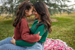 © Lupe Rodríguez/Stocksy - mother with little daughter on picnic
