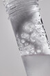 © Anna Tabakova/Stocksy - Soapy mixture in a plastic flask