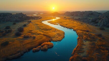 Wall Mural - Sunset aerial view of a winding river