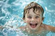 © Yuliia - African American children smiling and playing in pool