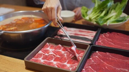 Canvas Print - Beef and pork meat hot pot at the restaurant