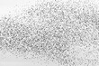 © Helen Rushbrook/Stocksy - Black and white image of a mass of tiny birds in flight.