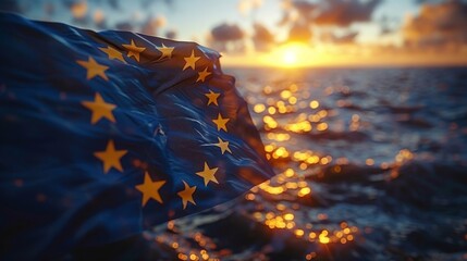 European Union flag flutters in the breeze as the sun sets over a calm sea, evoking a sense of unity and peace
