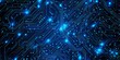 © Orod - Abstract blue circuit board pattern on a dark background.