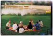 © Milles Studio/Stocksy - Group of young people picnicking in park