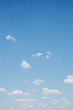 © Jovana Milanko/Stocksy - Soft blue sky with small white clouds