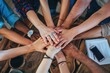 © Popelniushka - Strong Business Team: Young People Unite, Hold Hands in a Symbol of Unity and Collaboration