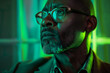 © Schizarty - African American Professor in Glasses Illuminated by Green Light