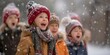 © Anastasiia - Young children in winter clothes singing Christmas carols on a snowy street. Concept Holiday Cheer, Christmas Carols, Winter Fashion, Snowy Scenery, Festive Mood