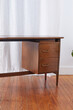 © Alene Pierro - Mid-Century Modern Desk. Vintage walnut office furniture. Photographed in a home interior.