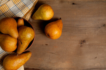 Wall Mural - Pears on wooden background as background image..