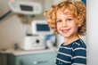 © MVProductions - Boy standing near medical equipment, suitable for healthcare concepts