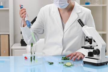 Wall Mural - Quality control. Food inspector checking safety of products in laboratory