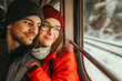 © MVProductions - Young couple looking out of the train window