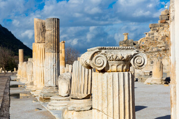 Wall Mural - View of remains of State Agora colonnade on background of small Odeon used as bouleuterion and theatre in Greek settlement of Ephesus after reconstruction