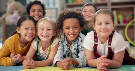 Canvas Print - Kindergarten friends, kids and face on floor with smile for education, knowledge and learning at academy. Students, diversity and happy in school for childhood development, scholarship and bonding