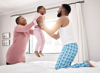 Wall Mural - Black family, happiness and child jump on bed for relationship love, support and playing game with energy. Young girl, African man and woman in bedroom with parents for morning and fun together