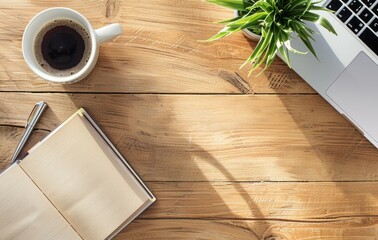 Photo of a desk with a wood grain texture, featuring an open notebook and coffee cup on the left side, viewed from above