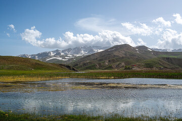 Wall Mural - Scenic views of Eğrigöl Lake and Geyik Mount which is on the Söbüçimen Plateau at the foothills of the Geyik Mountains of the Taurus Mountains, on the border of Konya and Antalya.