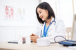 © anon - Healthcare, doctor and portrait of woman on tablet for medical analysis, research and internet. Hospital.Healthcare professional with a stethoscope.