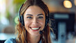 © Kiron - Cheerful young woman at work as a call center operator, headset and microphone in place, bright smile. Ai generated